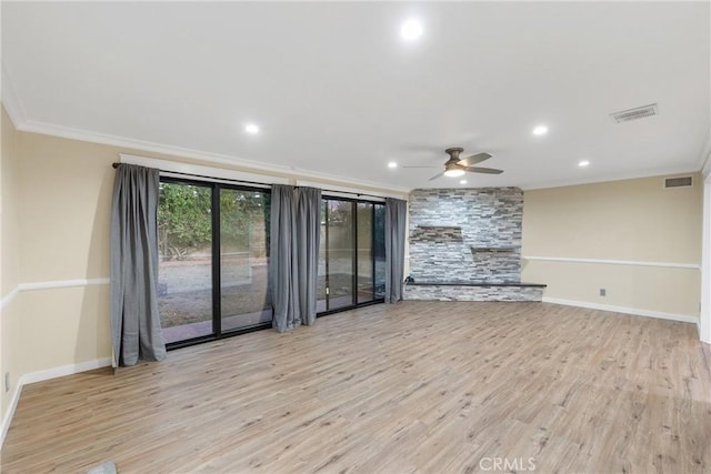 unfurnished living room with ceiling fan, light hardwood / wood-style floors, and ornamental molding