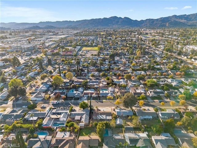 drone / aerial view featuring a mountain view