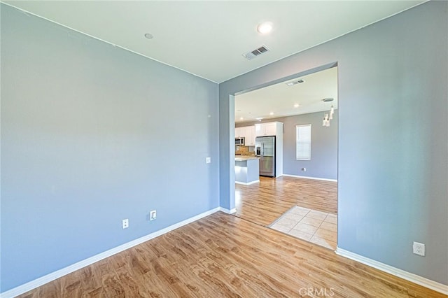 empty room featuring light hardwood / wood-style flooring