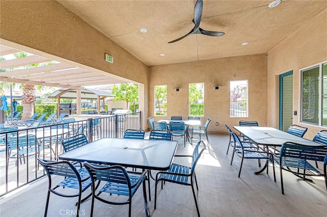 view of patio featuring ceiling fan and a pergola