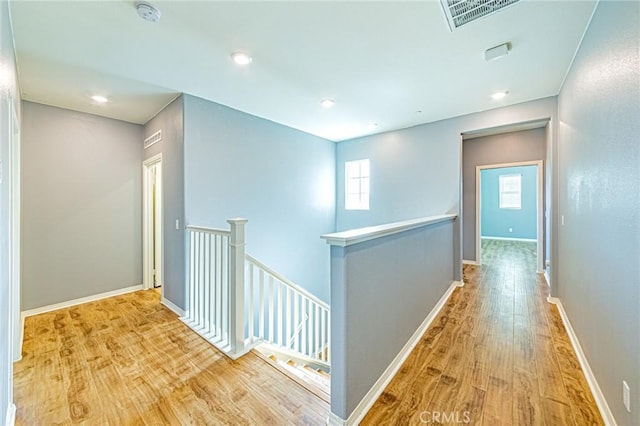 hallway featuring light hardwood / wood-style flooring