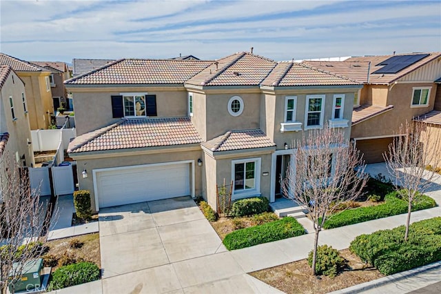 mediterranean / spanish-style house featuring a garage