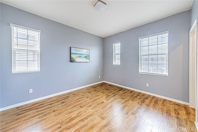 empty room with light wood-type flooring