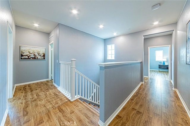 hall with light wood-type flooring