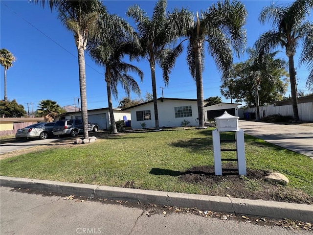 view of front facade with a front yard