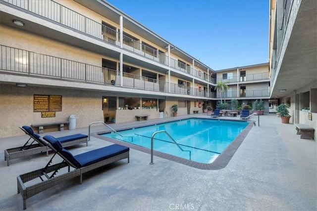 view of pool with a patio