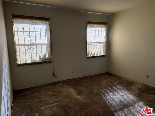 view of carpeted spare room