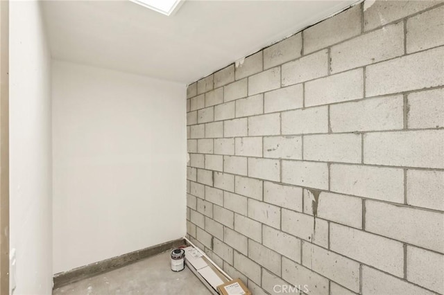 bathroom featuring concrete floors