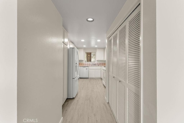 hall featuring light hardwood / wood-style floors