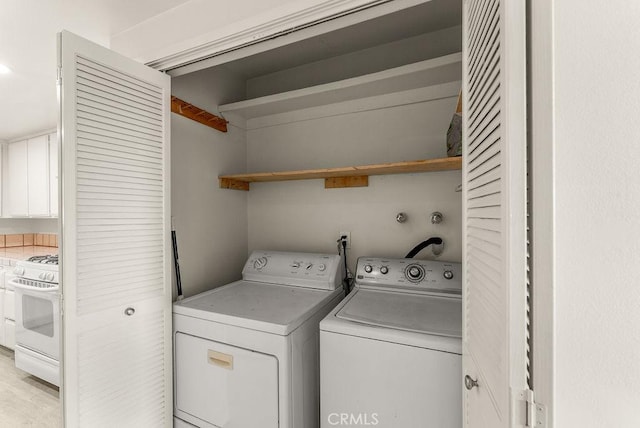 washroom featuring separate washer and dryer