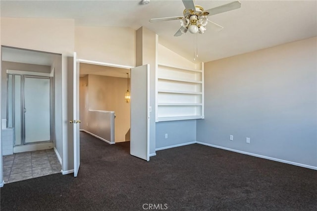 unfurnished bedroom featuring dark colored carpet, ceiling fan, and lofted ceiling