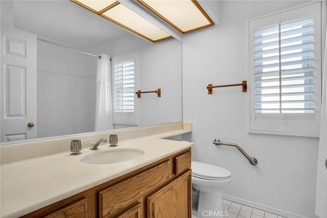 bathroom with tile patterned floors, vanity, toilet, and a shower with curtain