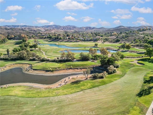 view of property's community featuring a water and mountain view