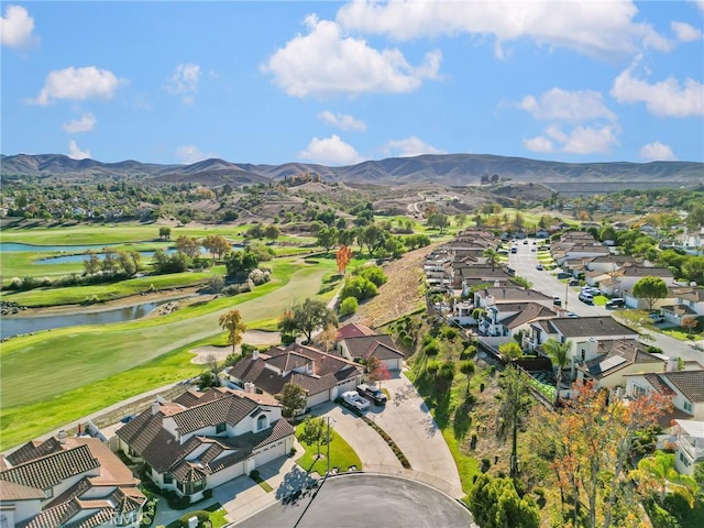 bird's eye view featuring a water and mountain view