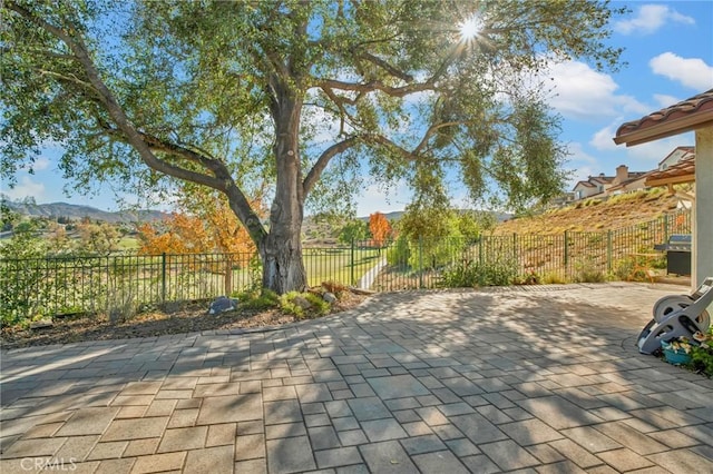 view of patio with a mountain view