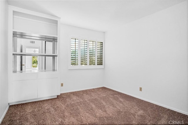 view of carpeted empty room