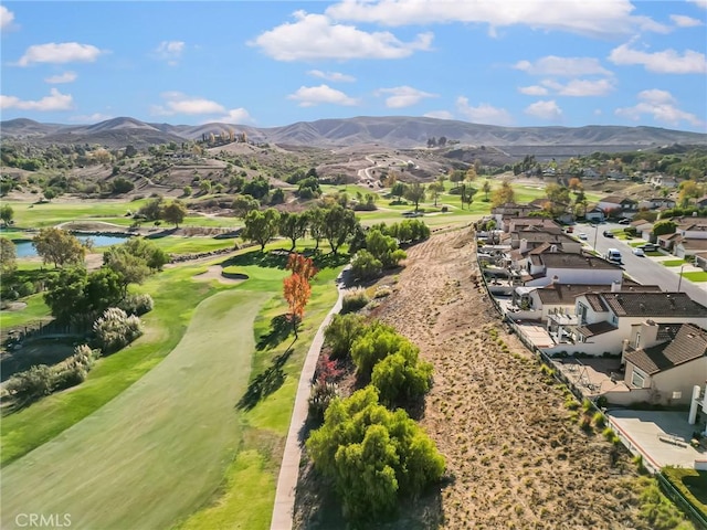 bird's eye view with a water and mountain view