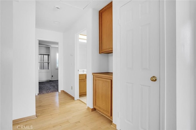 hallway featuring light hardwood / wood-style floors