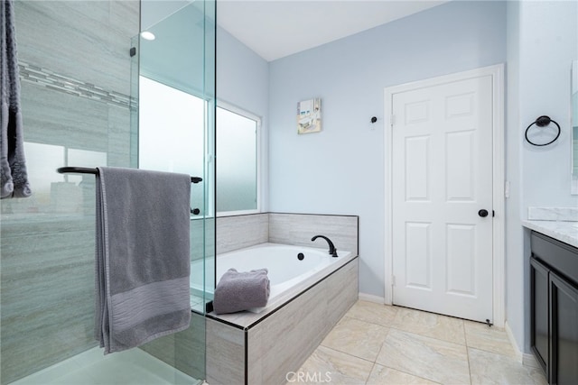 bathroom with shower with separate bathtub and vanity