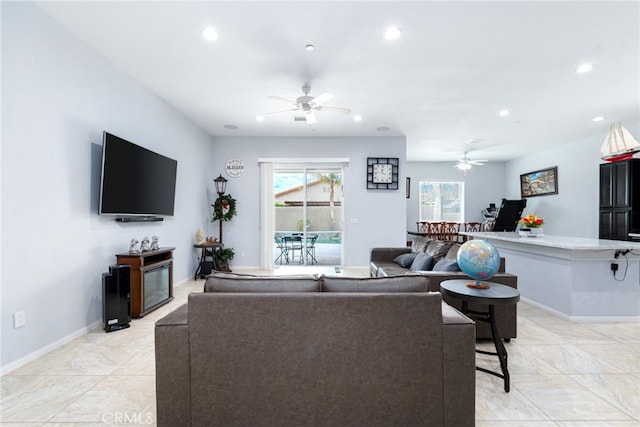 living room featuring ceiling fan