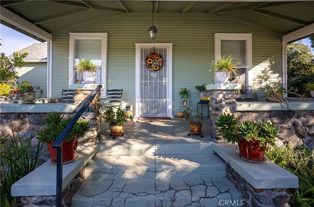 property entrance with a porch