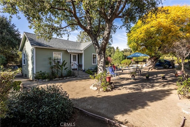 view of front of property with a patio