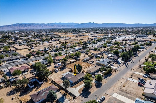 bird's eye view with a mountain view