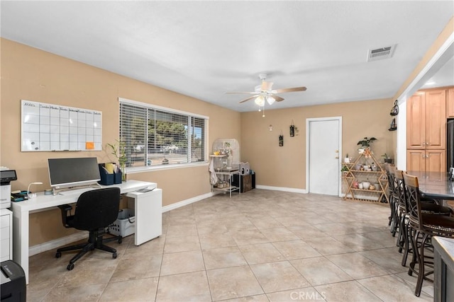 office area with ceiling fan and light tile patterned floors