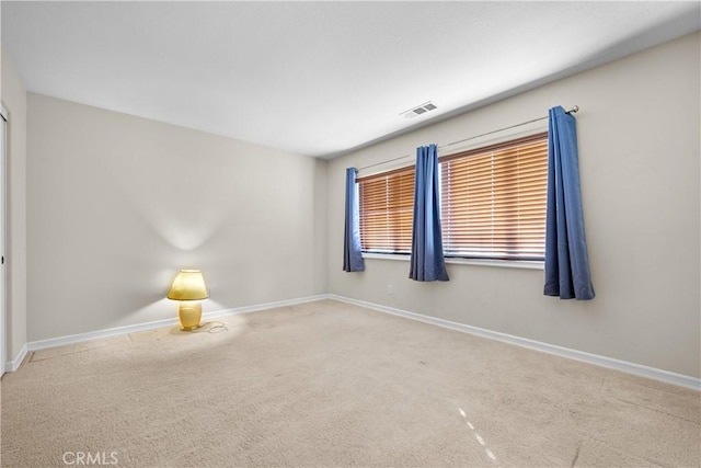 view of carpeted spare room