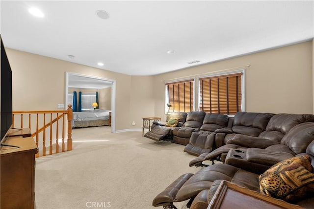 living room featuring light colored carpet