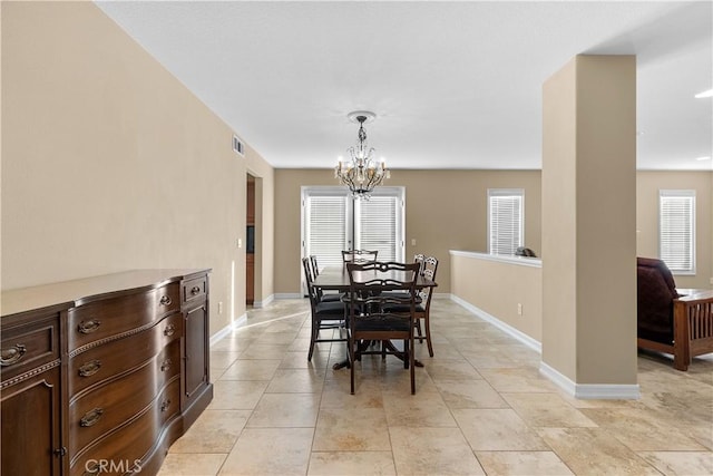 dining room with an inviting chandelier