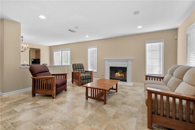 living room with a chandelier