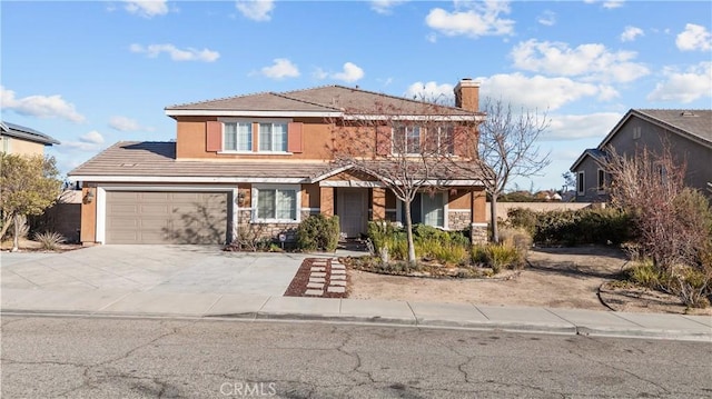 front of property featuring a garage