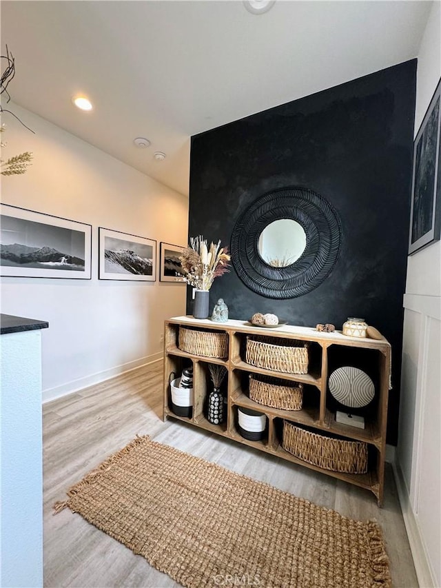 mudroom with hardwood / wood-style floors