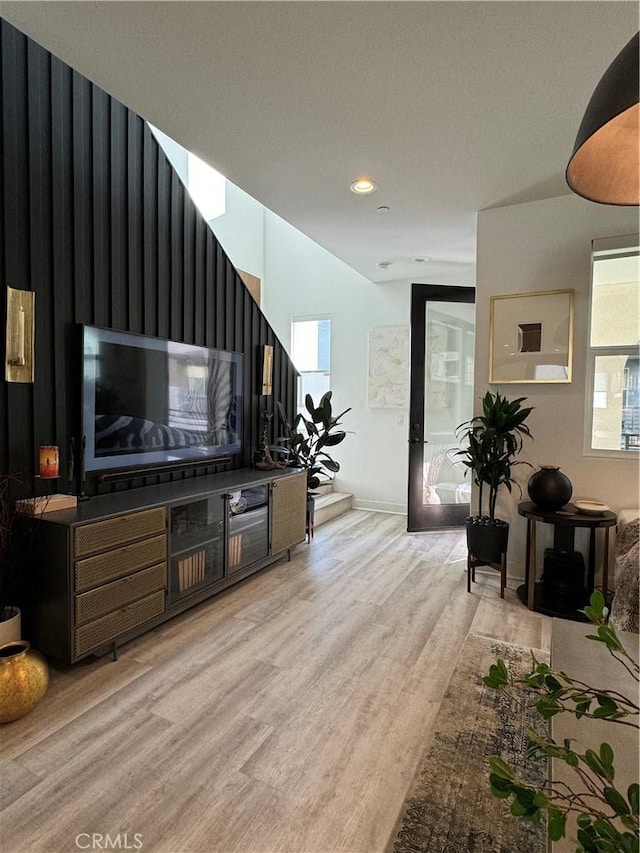 living room with light hardwood / wood-style floors