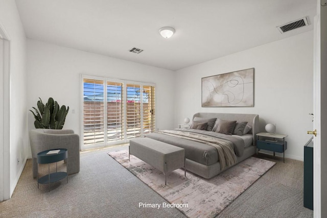 bedroom featuring carpet flooring and access to outside