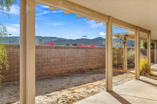 view of patio with a mountain view