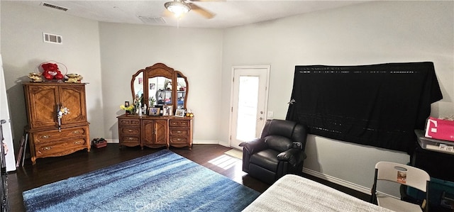 bedroom featuring ceiling fan, dark hardwood / wood-style floors, and vaulted ceiling