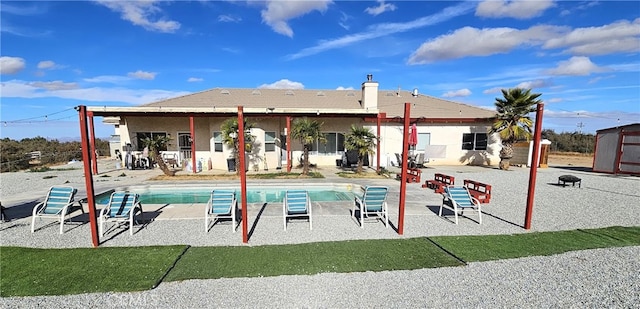 rear view of house featuring a patio area