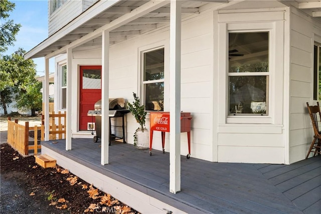 property entrance with a wooden deck