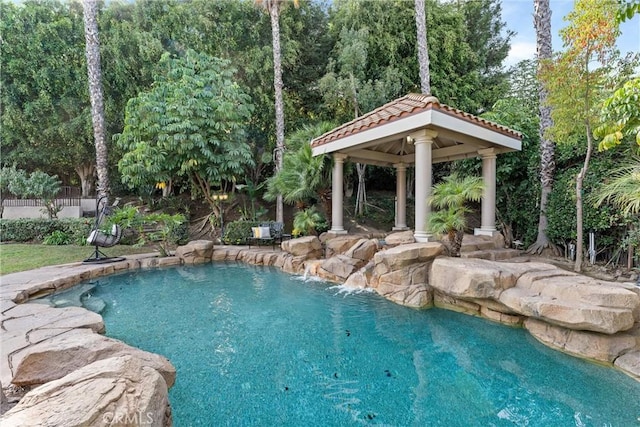 view of swimming pool with a gazebo