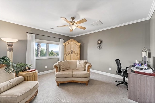 office with light colored carpet, ceiling fan, and ornamental molding