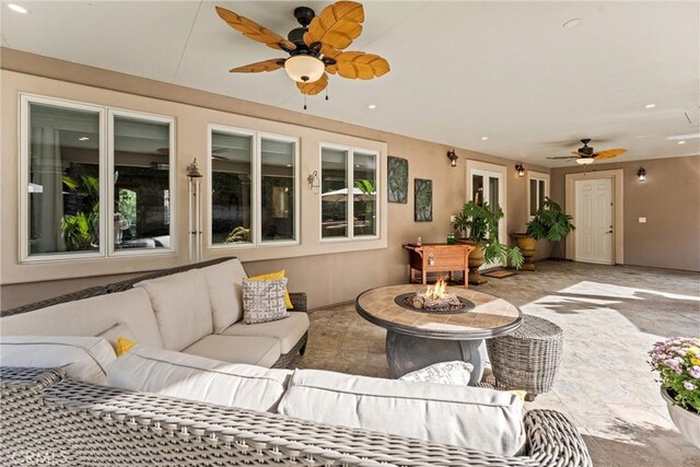 interior space featuring an outdoor living space with a fire pit