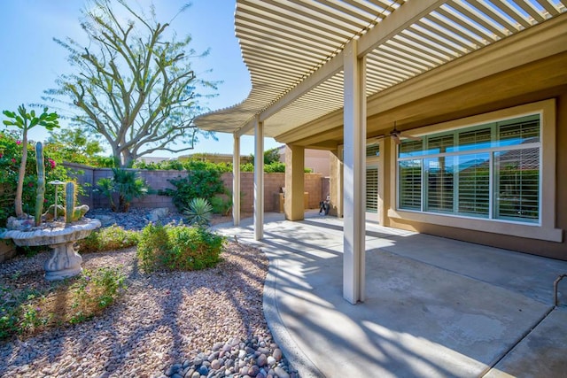 view of patio with a pergola and ceiling fan