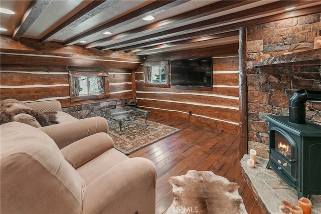 27554 N Bay Rd, Lake Arrowhead, CA 92352 - living area featuring a wood stove, hardwood / wood-style floors, beamed ceiling, and wooden walls