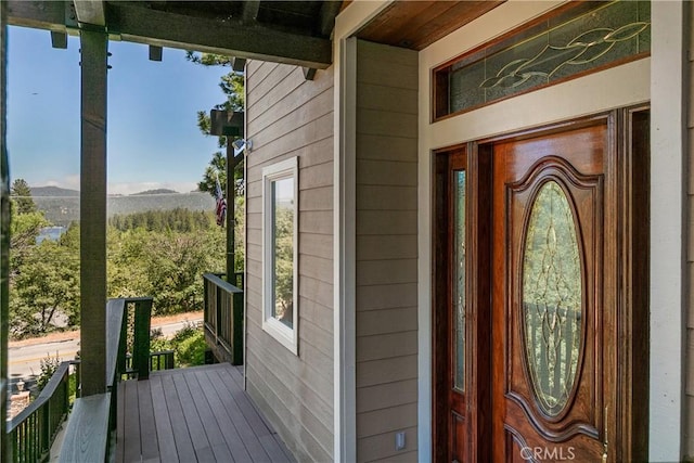 entrance to property with covered porch