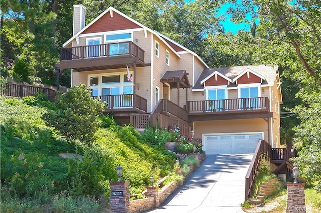 27554 N Bay Rd, Lake Arrowhead, CA 92352 - craftsman inspired home with a balcony, driveway, a chimney, and a garage