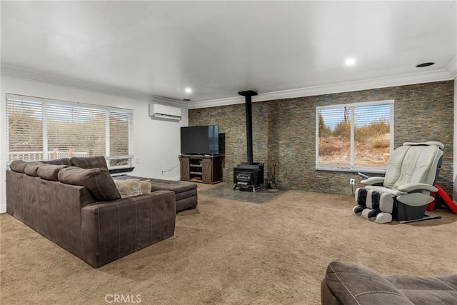 living room with carpet, a wood stove, crown molding, and a wall unit AC