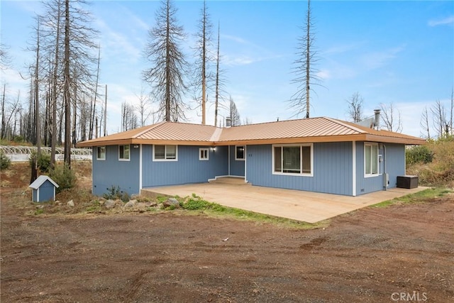 rear view of property with a patio