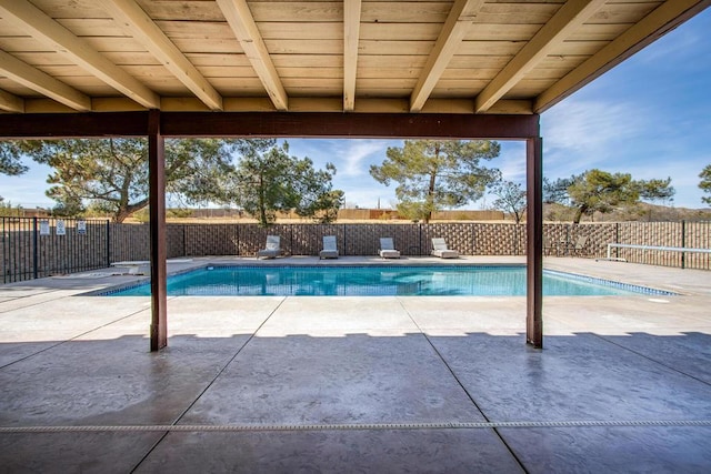 view of pool featuring a patio